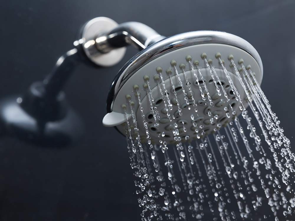 Quick cleaning tips include soaking a shower head overnight