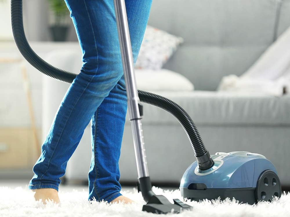 Woman with vacuum