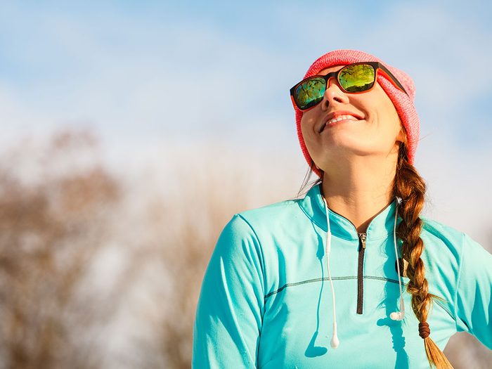 Woman wearing sunglasses during running