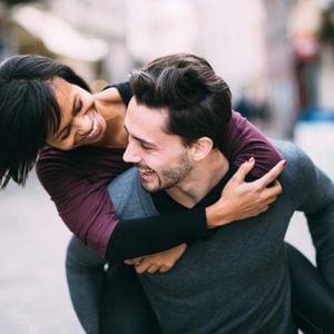 How to make your relationship last - man and woman piggyback