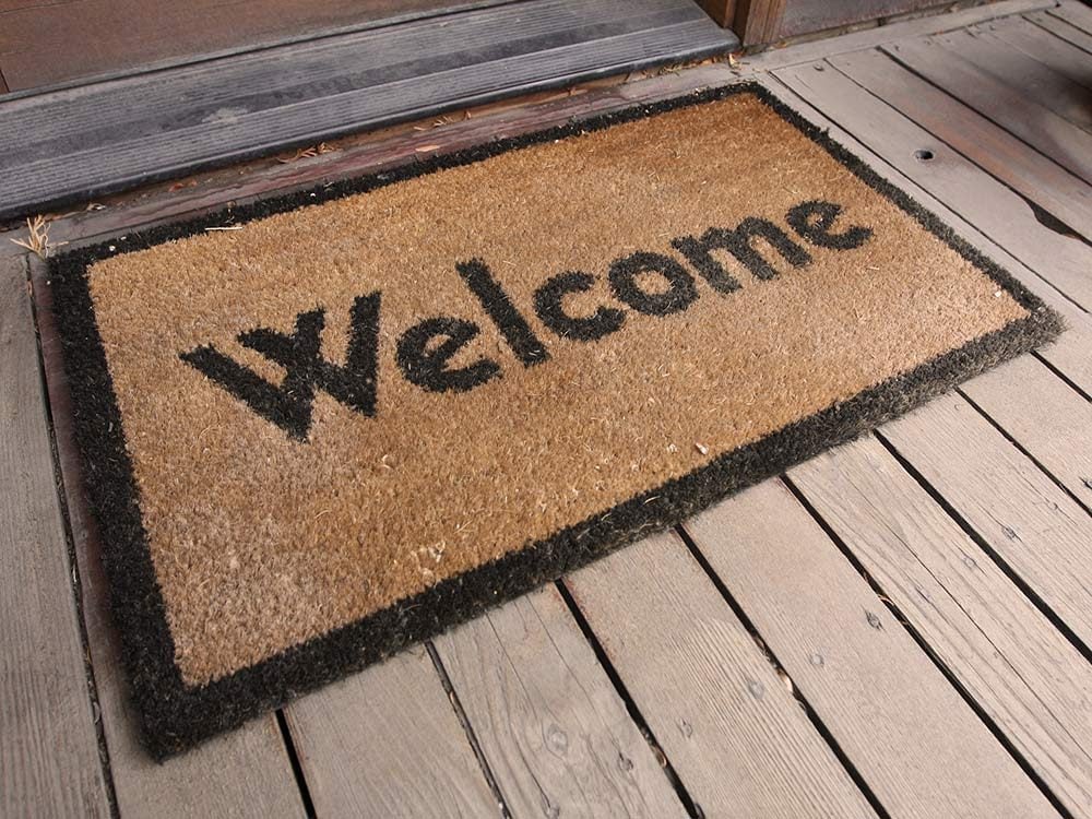 Welome doormats on front porch