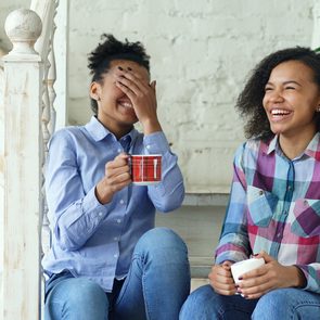 Stress management tips - Two friends laughing