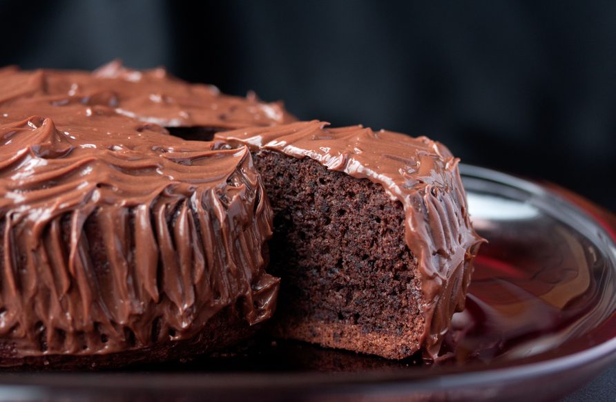 Chocolate mud cake being sliced