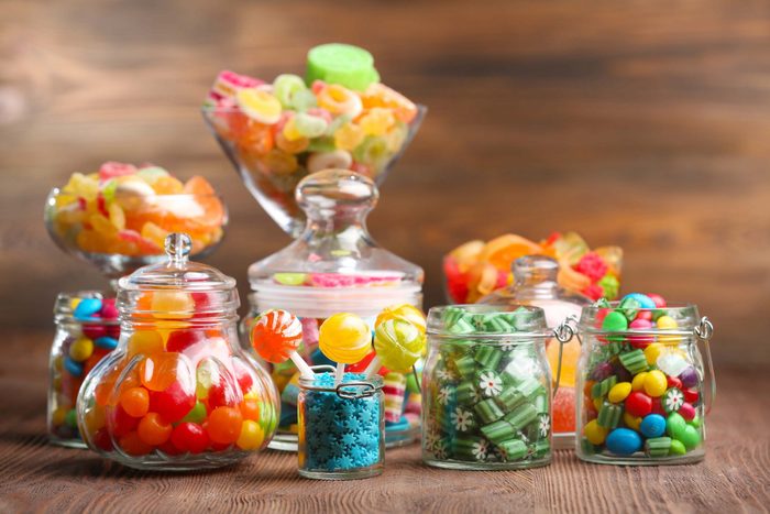 Colourful assorted candies in jars