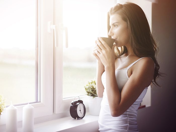 Relief from chronic fatigue - woman drinking coffee in the morning