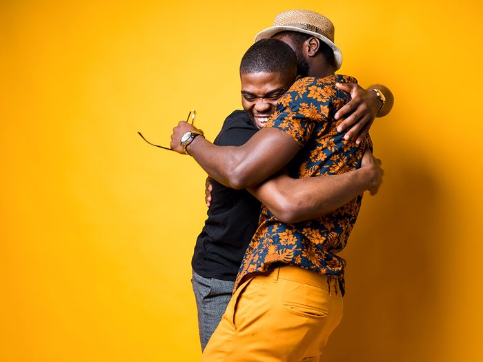 Science behind friendship - two men hugging