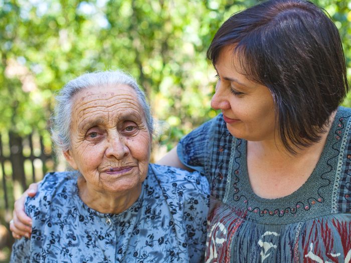 Caring for aging parents - woman with her aging mother