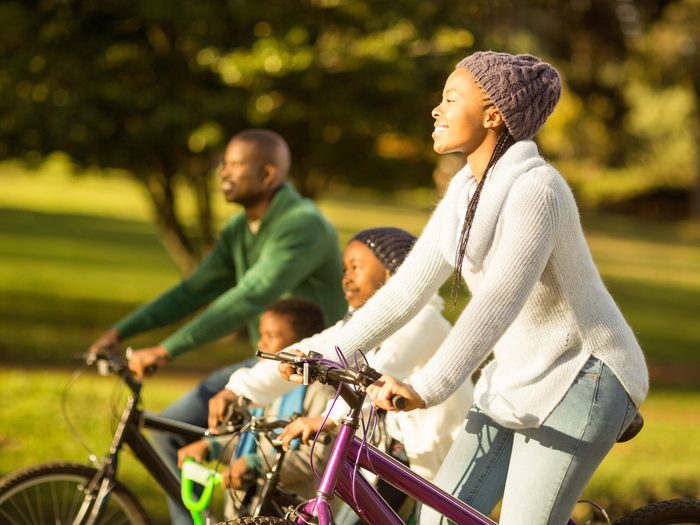 African-American family going on a bike ride
