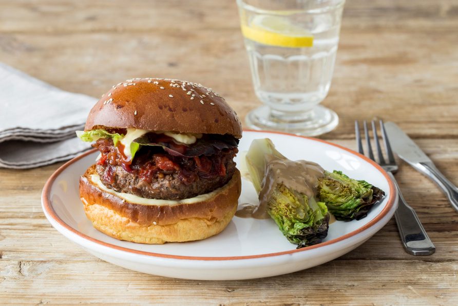 Juicy Lucy Burger with Tomato-Onion Jam and Charred Baby Gem Lettuce