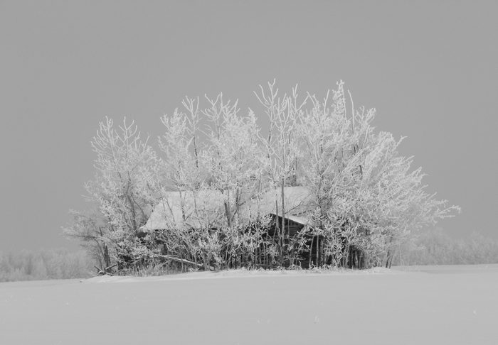 Snow covered farmhouse