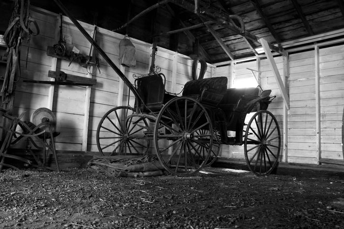 Old buggy in barn