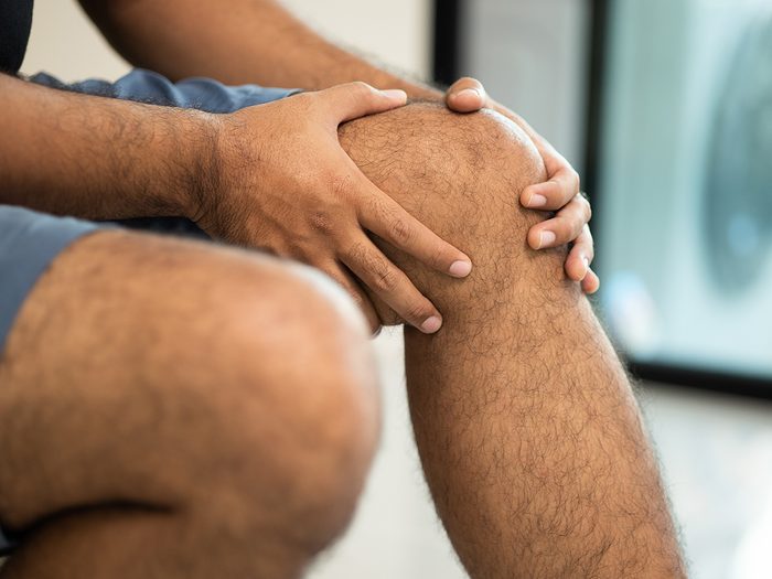 Arthritis myths - man with sore knee