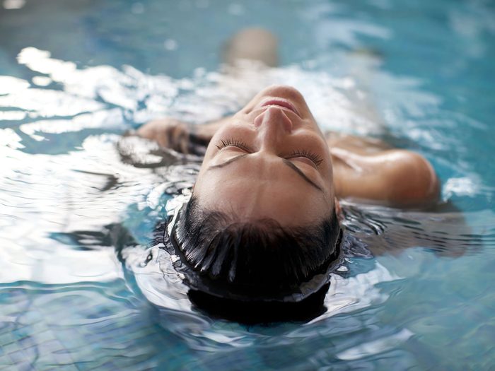 Woman engaging in hydrotherapy