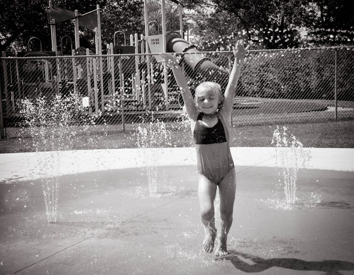 Little girl making a splash