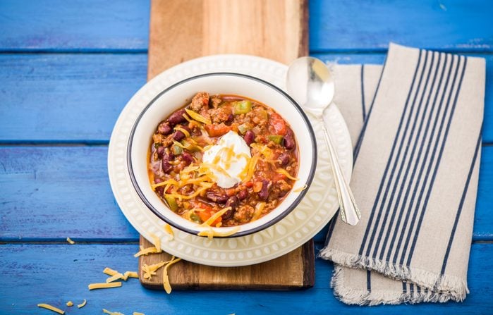 Beef chili with kidney beans, cheddar and sour cream