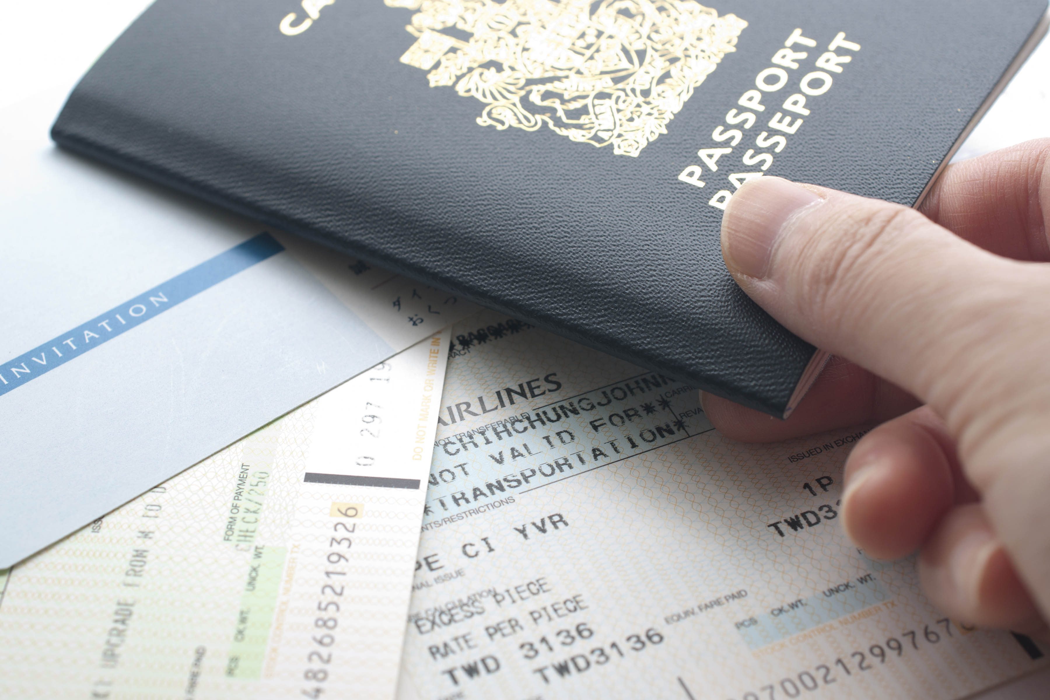 Canadian passport and boarding pass