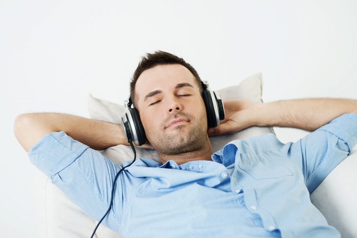 Man sleeping with headphones