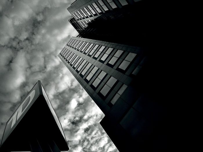 Black and white photo of sky and buildings