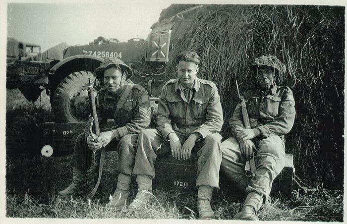 Old World War II photo featuring three soldiers for Remembrance Day