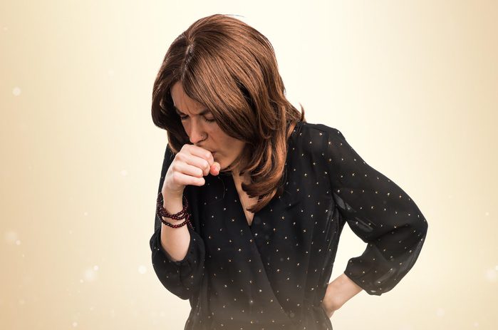 Woman coughing 