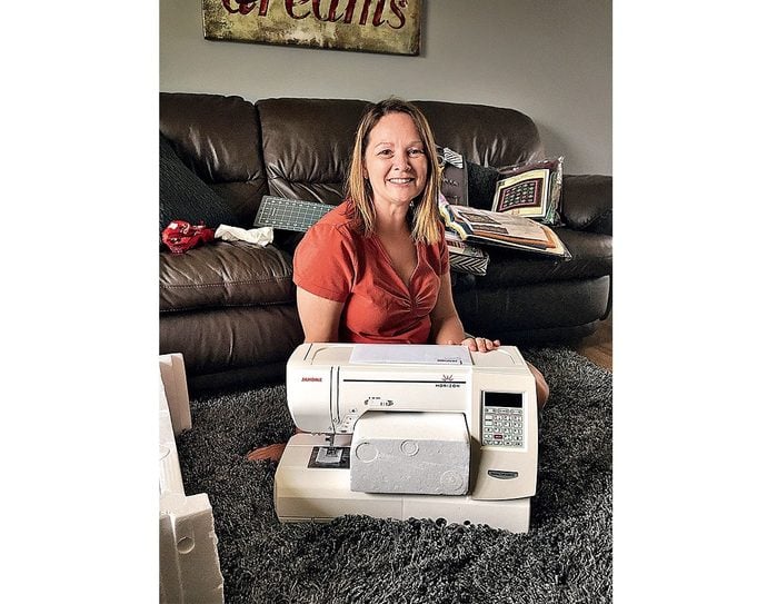 Eldora Bailie with her new sewing machine