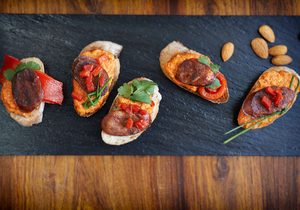 Chorizo Tapas with Roasted Red Pepper Sauce