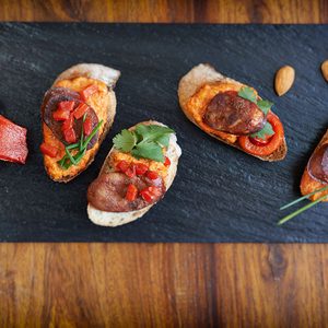 Chorizo Tapas with Roasted Red Pepper Sauce