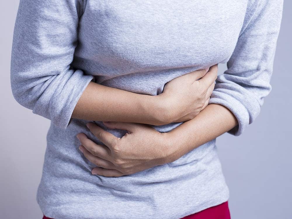 Woman with stomach problems