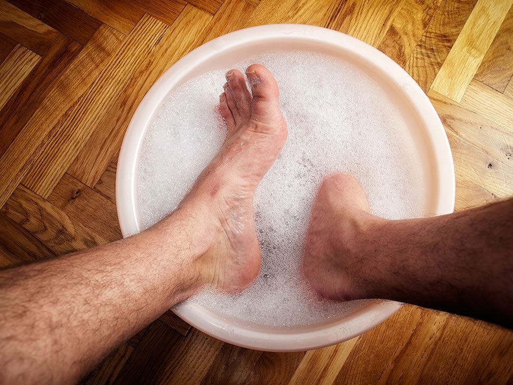 Feet soaking in a warm bath
