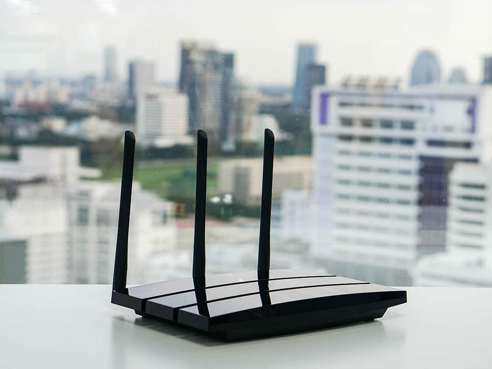 Wireless router on desk with a view of the city