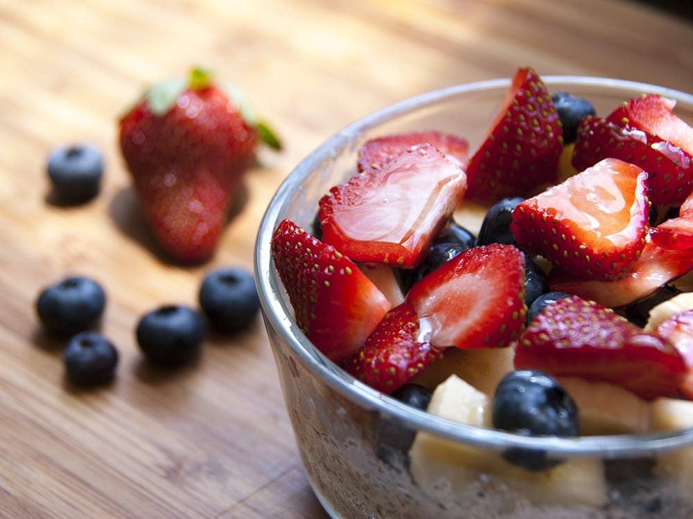 Mixed berries and bananas in bowl