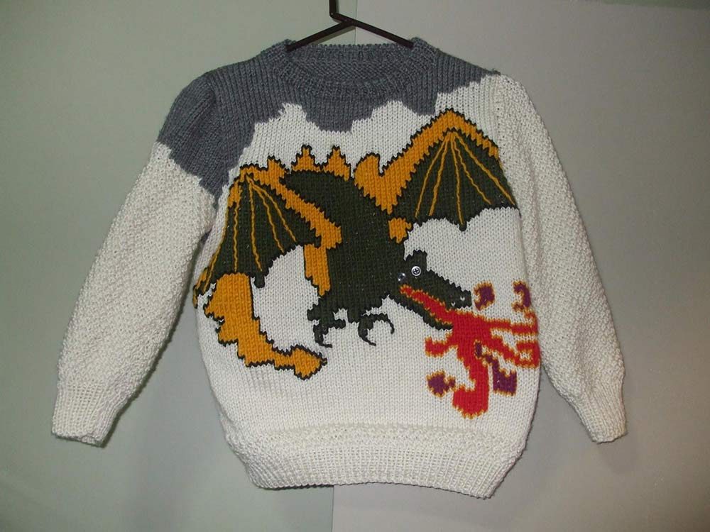 Knitted sweater with dragon design