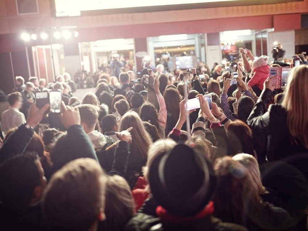 Paparazzi and fans at movie premiere
