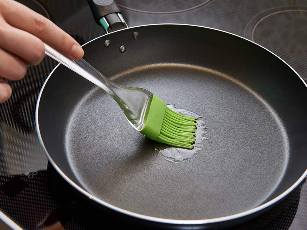 Canola oil brushed onto pan