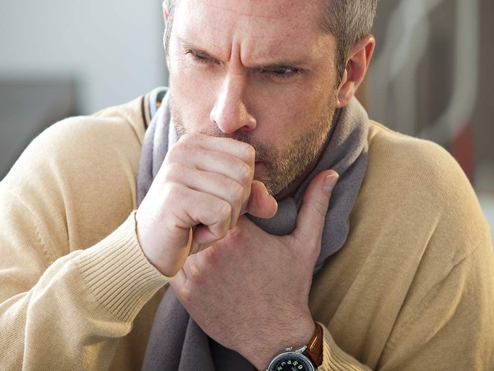 Middle-aged man coughing