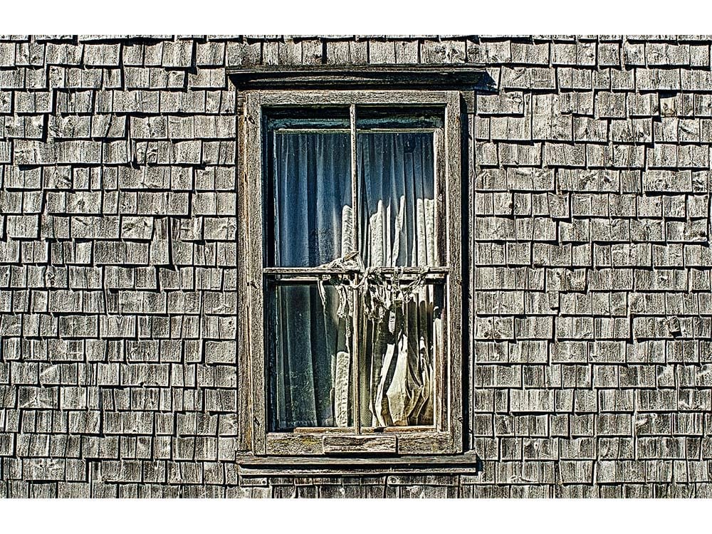 Bedroom window of abandoned home