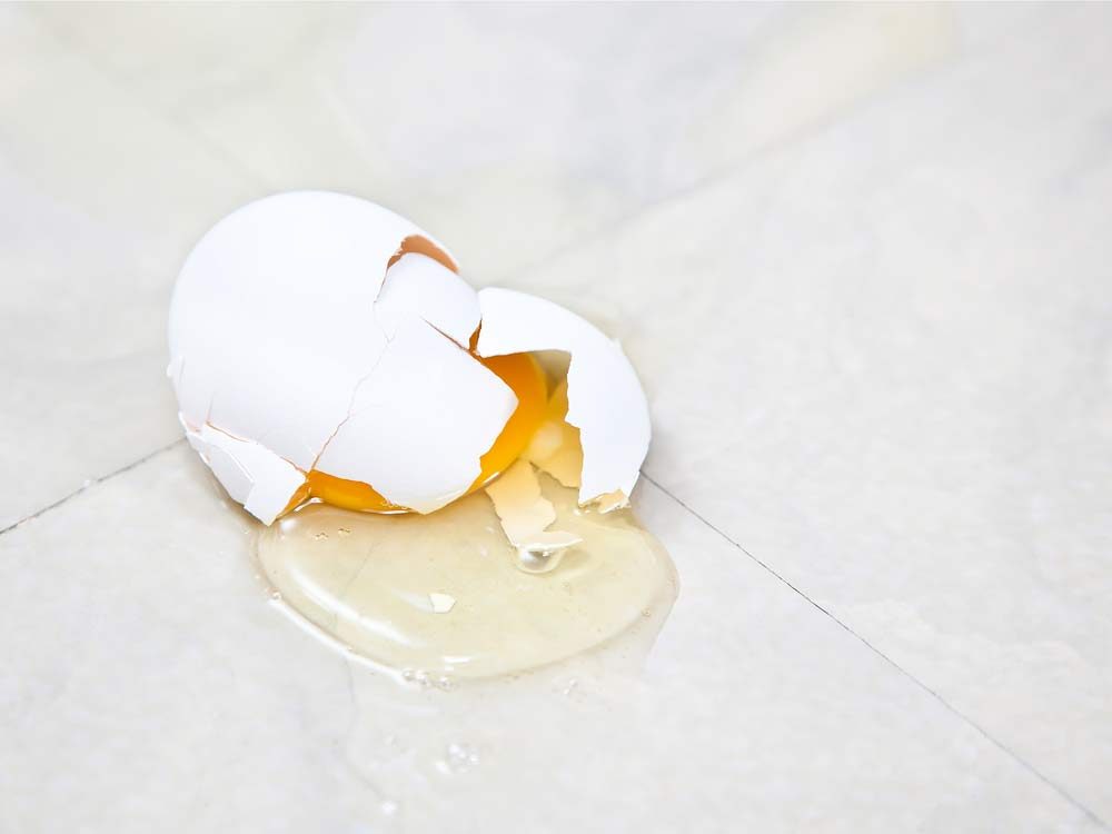 Smashed egg on kitchen floor