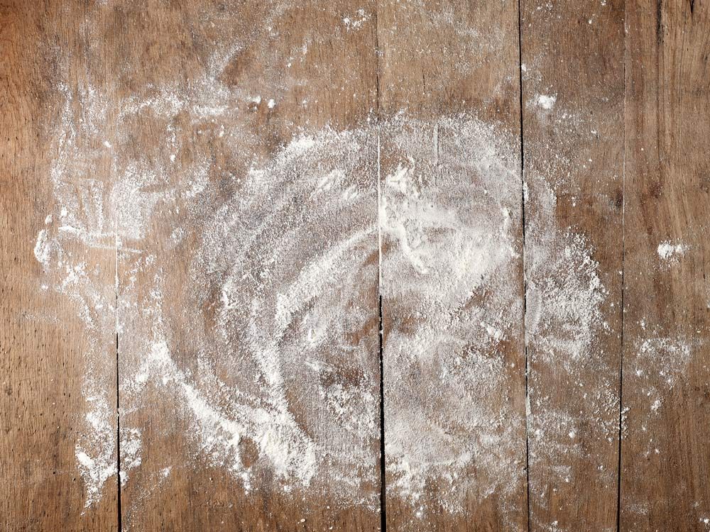 Flour on wooden table