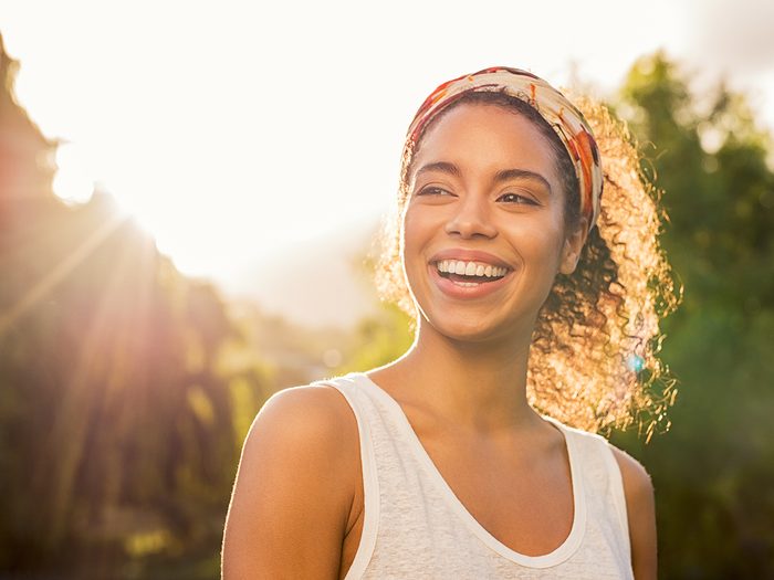 Mineral sunscreen benefits - woman enjoying safe sun