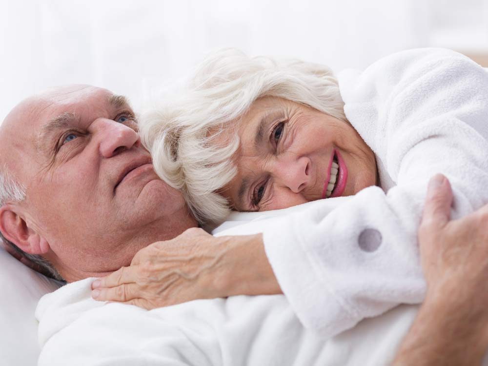 Elderly couple embracing