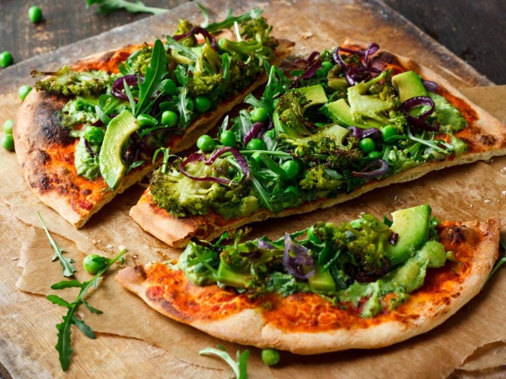 Vegan pizza with avocado
