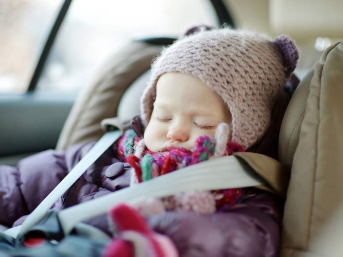 Baby in car seat during winter