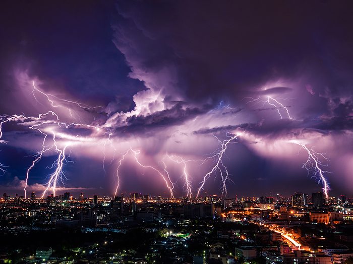 Lightning facts - Lightning storm over city in purple light