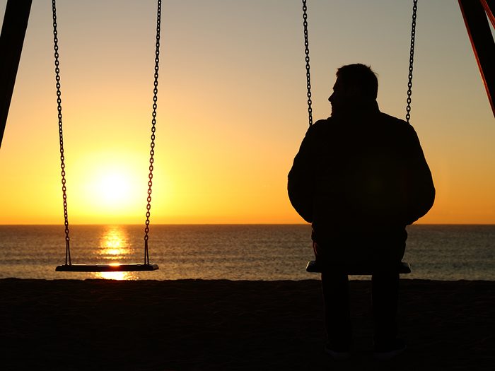 How to deal with grief - man alone on swings