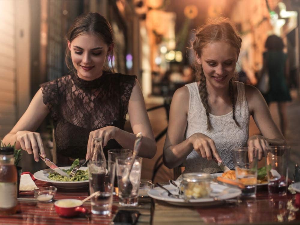 Young ladies dining in Italy