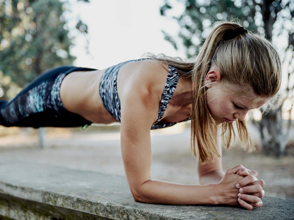 Fit woman planking