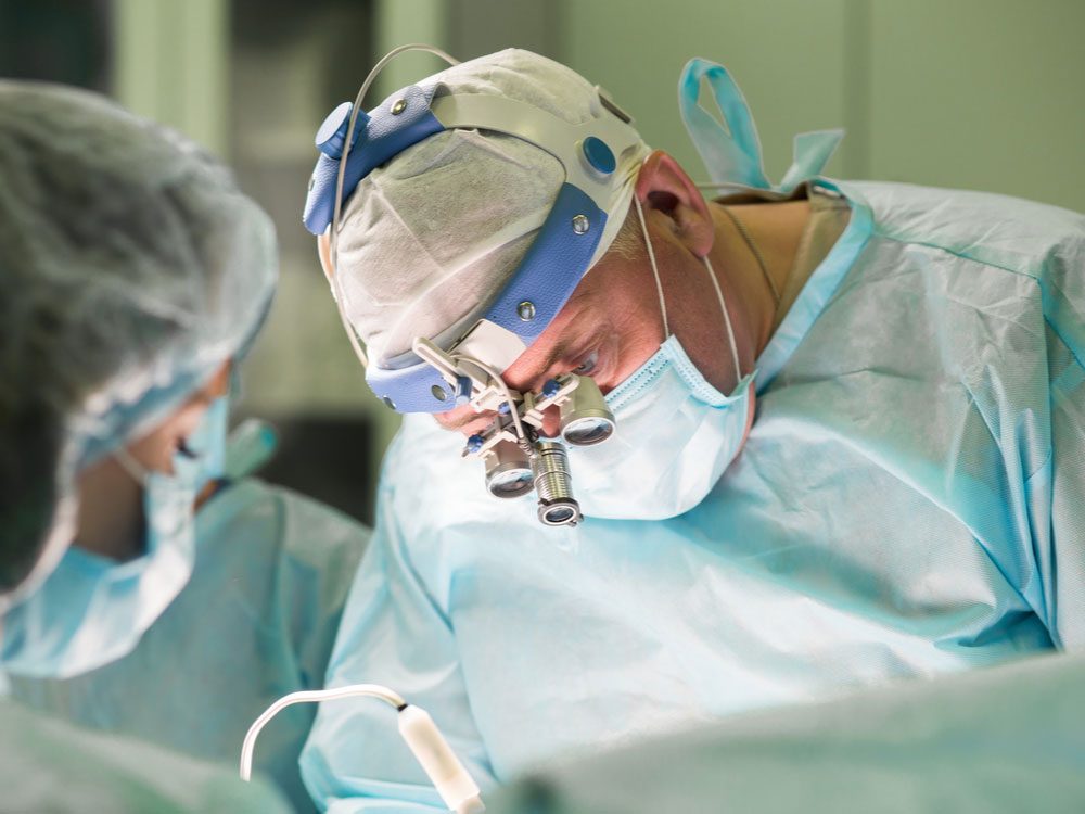 Surgeon performing procedure