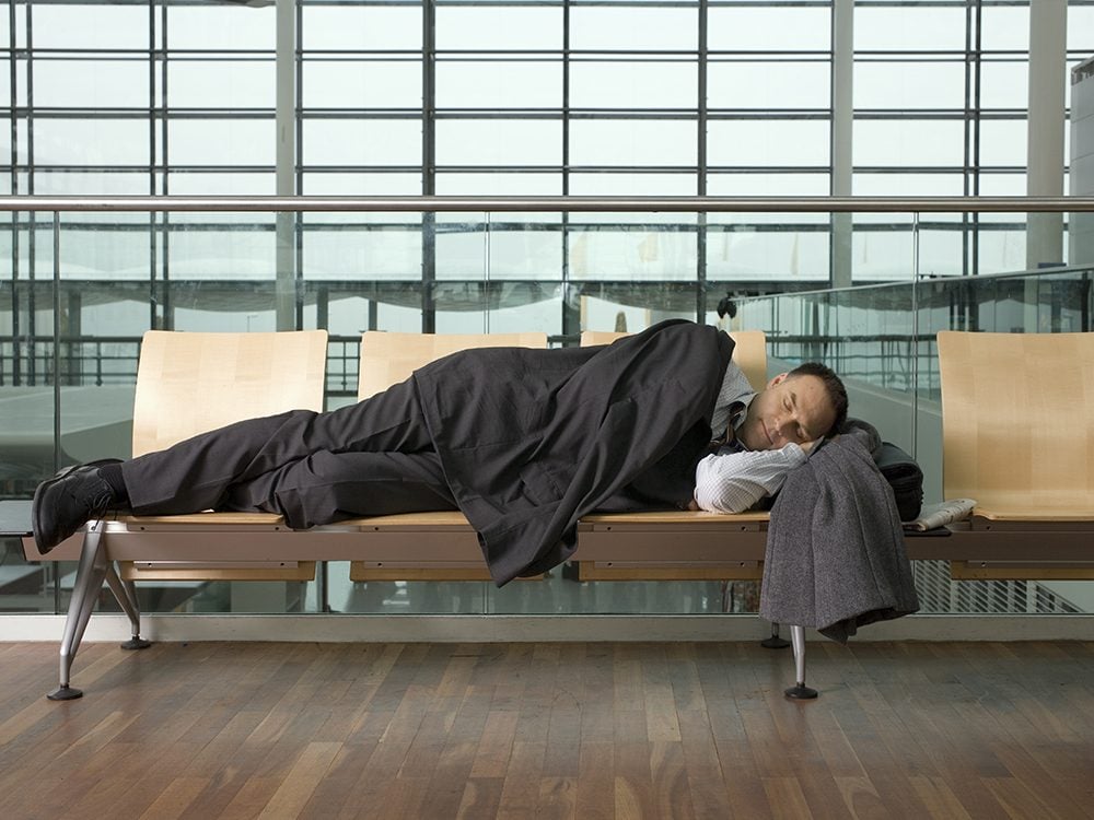 Man sleeping in airport