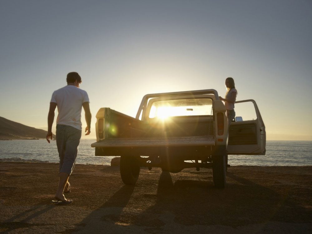 Pick-up truck at beach