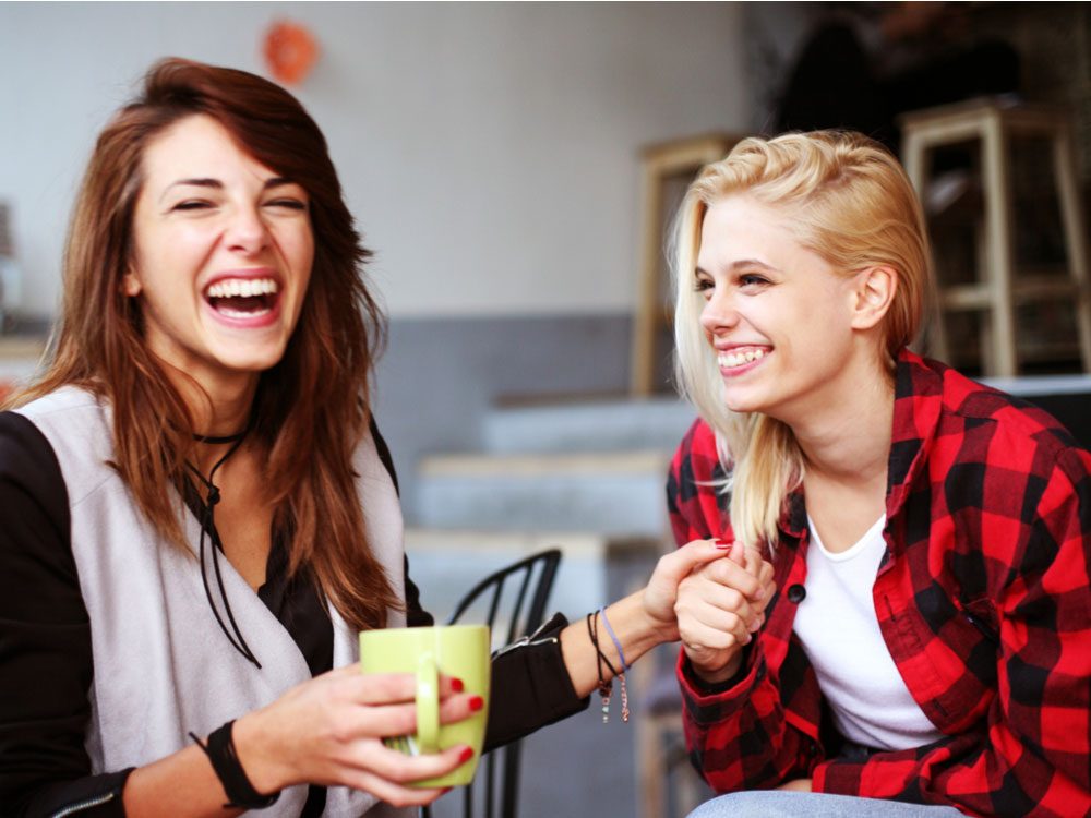 Two friends laughing